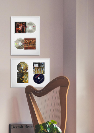 Ramka na płytę CD w kolorze białym. Ramka aluminiowa o rozmiarze 21x30 cm