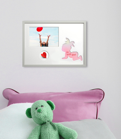Ramka na zdjęcia do pokoju dziecięcego biała. Ramka z passe partout o rozmiarze 21x30 cm